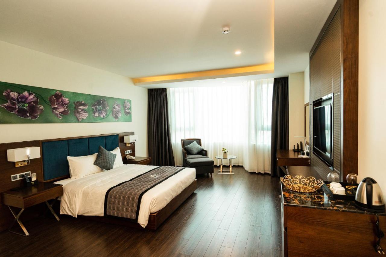 Eagle Hotel Dai Tiet Экстерьер фото