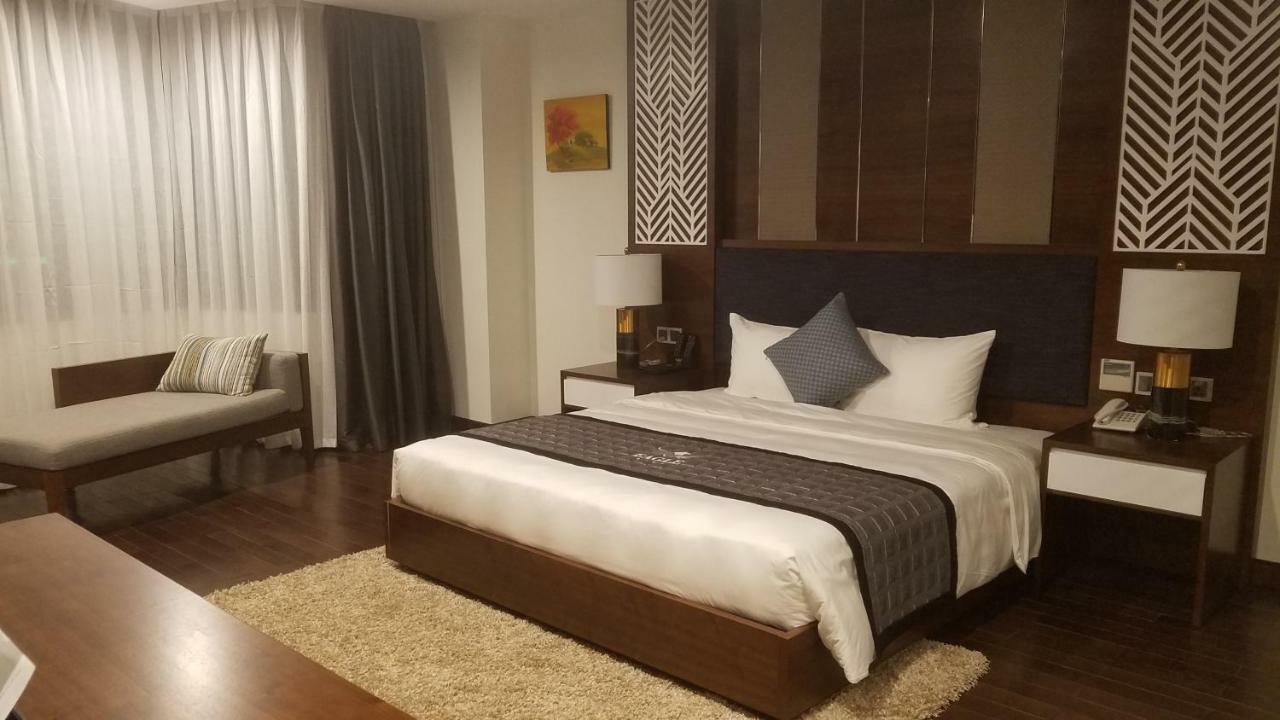 Eagle Hotel Dai Tiet Экстерьер фото